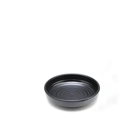 a black bowl with a spiral pattern