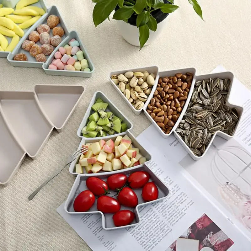 a trays of food in the shape of a christmas tree