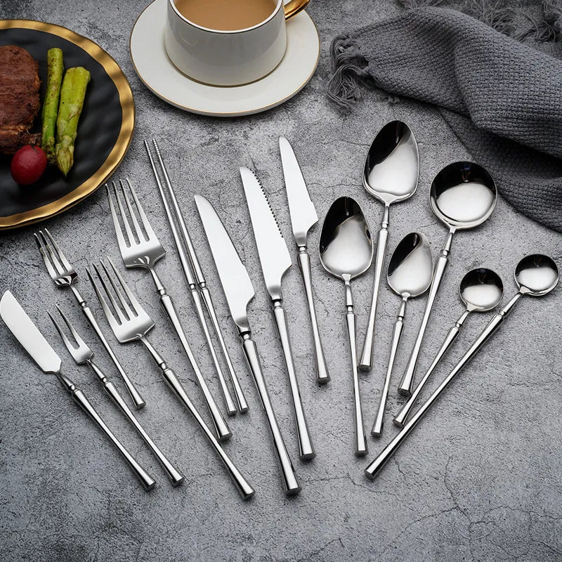 a full silverware set on a table