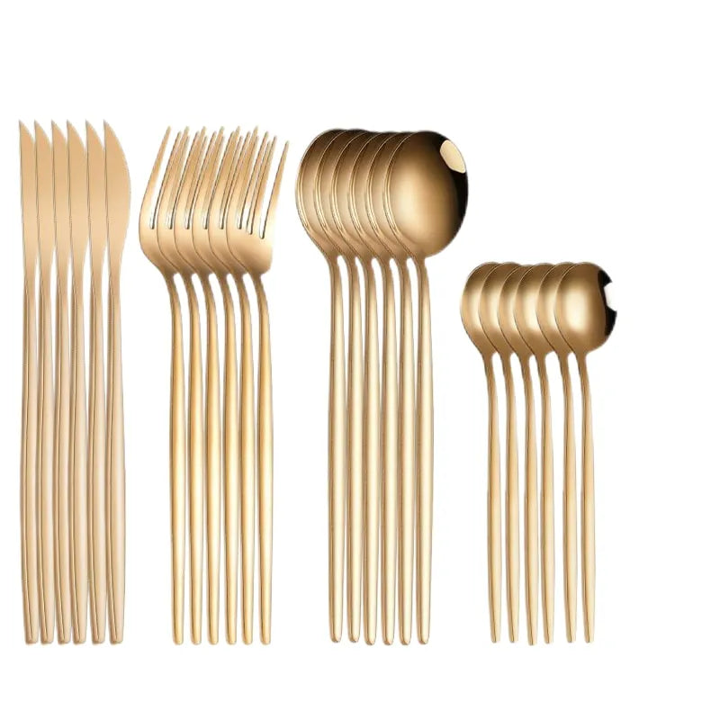 gold forks spoons and knifes in groups by six