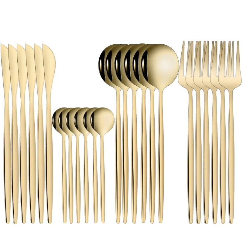 gold forks spoons and knifes in groups by six