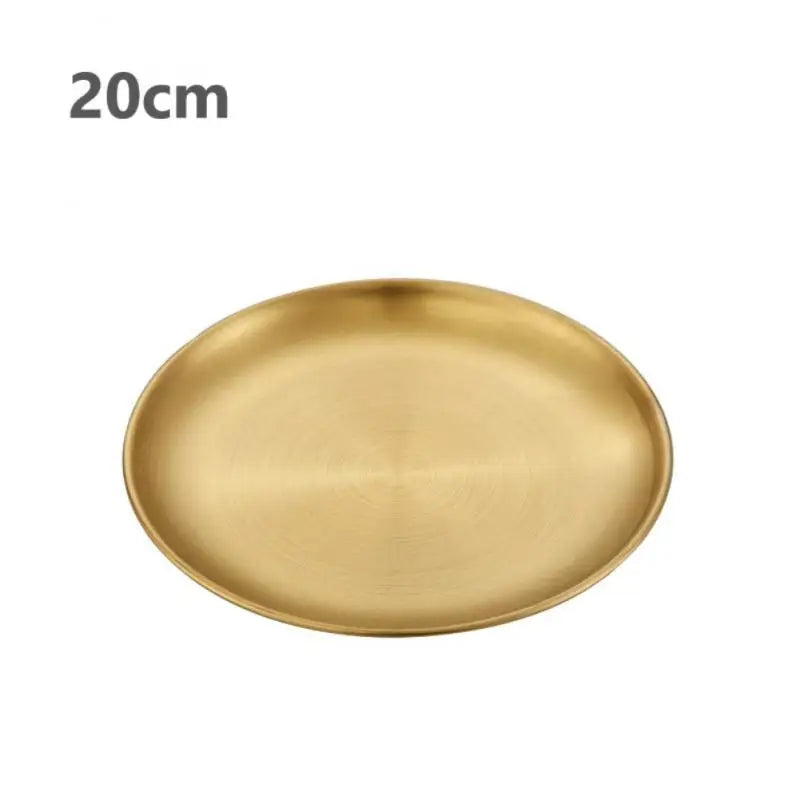 a gold stainless steel round plate with a white background 20 cm