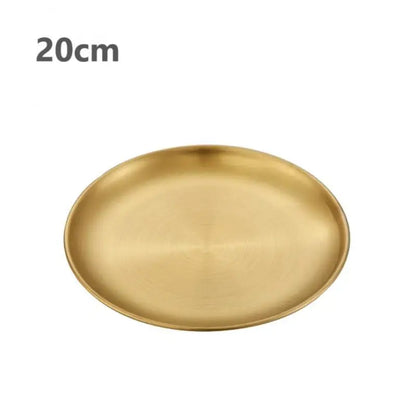 a gold stainless steel round plate with a white background 20 cm