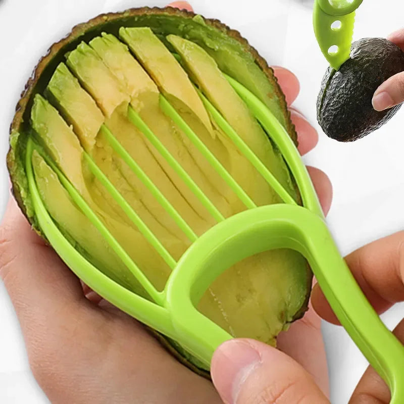 person peeling an avocado with avocado cutter