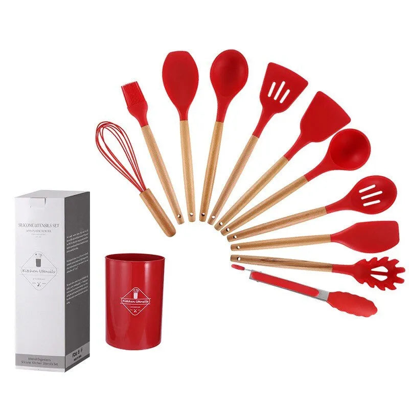 red kitchen utensils set with wooden handles with container