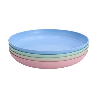 set of four wheat straw plates of different colors