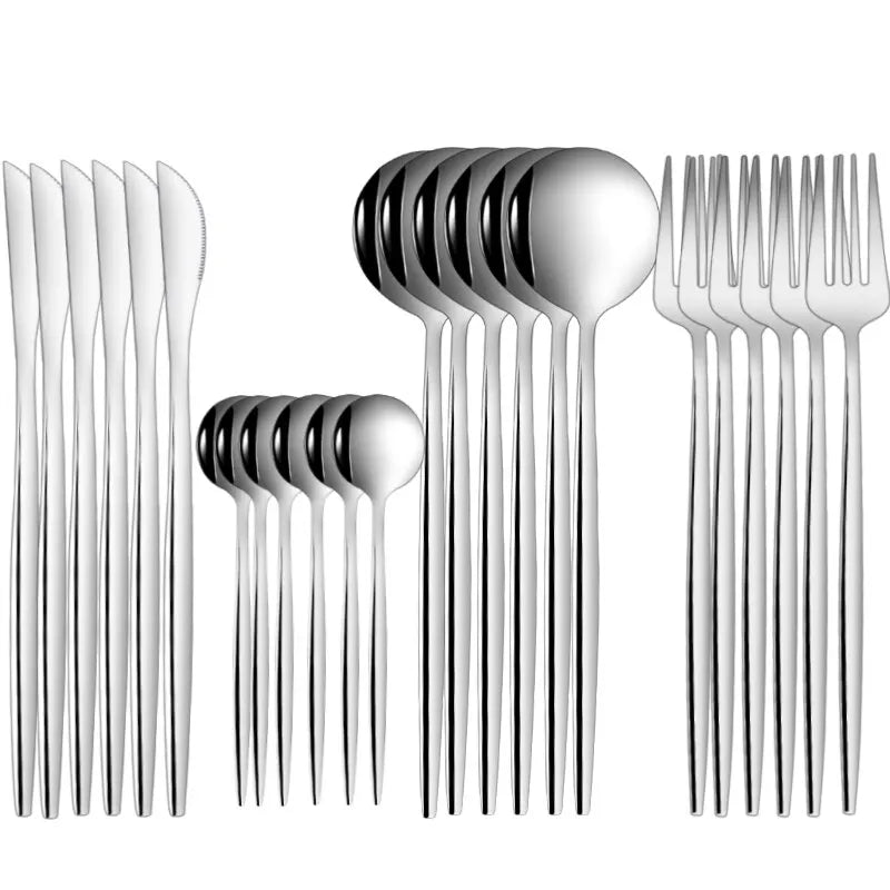 silver forks spoons and knifes in groups by six