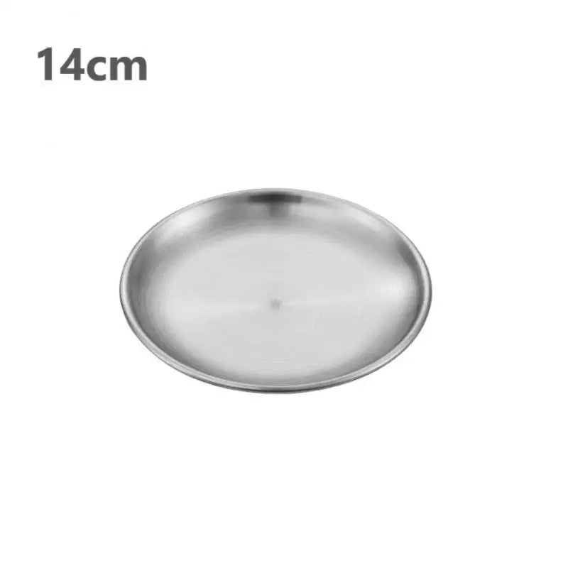 a silver stainless steel round plate with a white background 14 cm