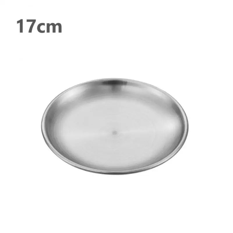 a silver stainless steel round plate with a white background 17 cm