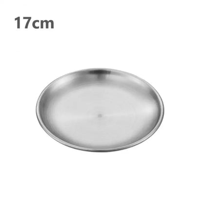 a silver stainless steel round plate with a white background 17 cm
