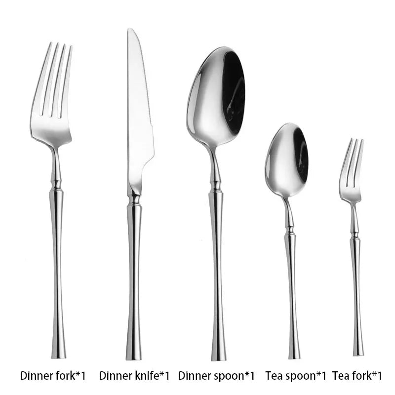 a silverware set with a dinner fork knife spoon and a tea spoon and tea fork