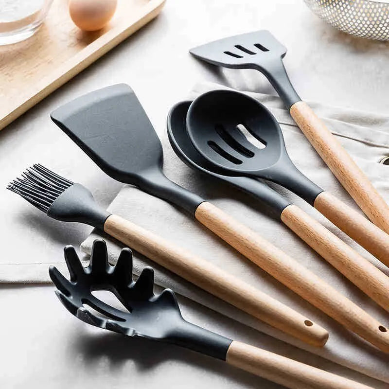 set of kitchen utensils with wooden handles