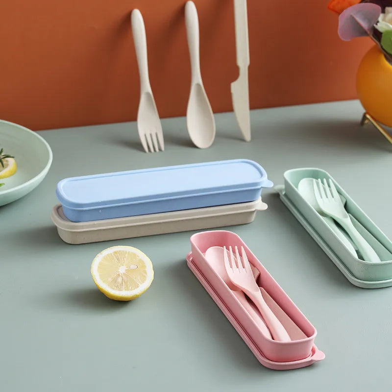 wheat straw travel cutlery on a table and a lemon 